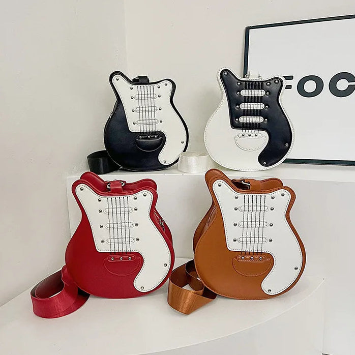 Four guitar-shaped bags in black, white, red, and brown