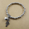 Treble Clef Bell Bracelet