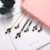 Black Music Notes Tassel Earrings