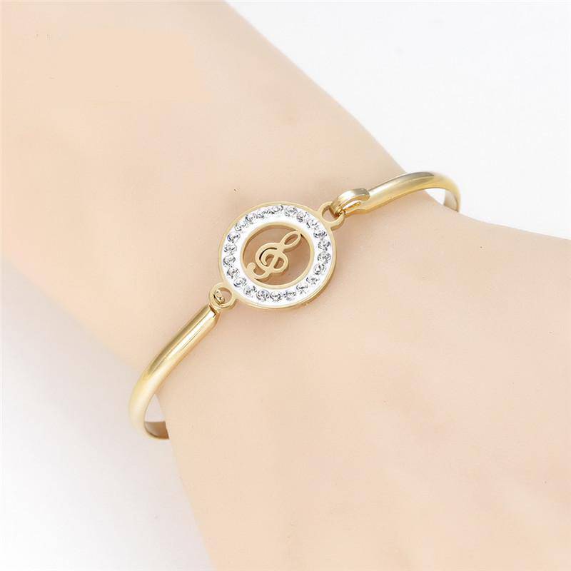 Rhinestone Treble Clef Hollow Bangle