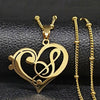 Treble & Bass Clef Heart Necklace