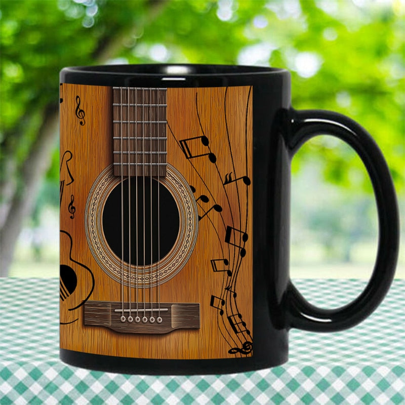 https://artistic-pod.com/cdn/shop/products/Dropshipping-New-Design-Black-Coffee-Mug-Milk-Tea-Cup-Music-Guitar-Beer-Mugs-Surprised-Gift-for_41d571a9-8a3e-41eb-a22b-9c679dd69622_800x.jpg?v=1668487082