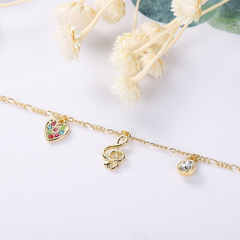 Rhinestone Heart Treble Clef Bracelet