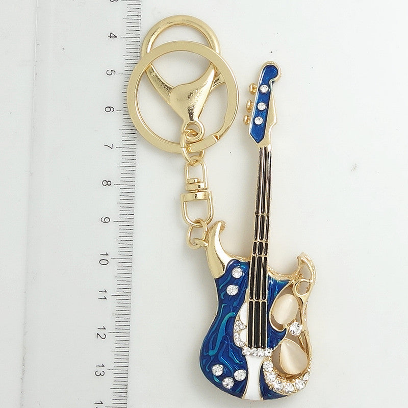 Free - Crystal Guitar Keychains - Artistic Pod Review