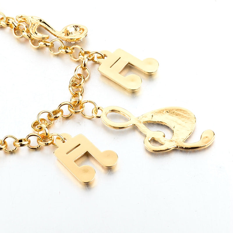 Crystal Music Notes Charm Bracelet