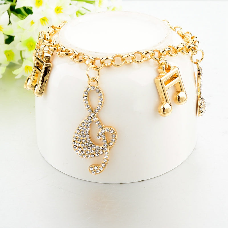 Crystal Music Notes Charm Bracelet