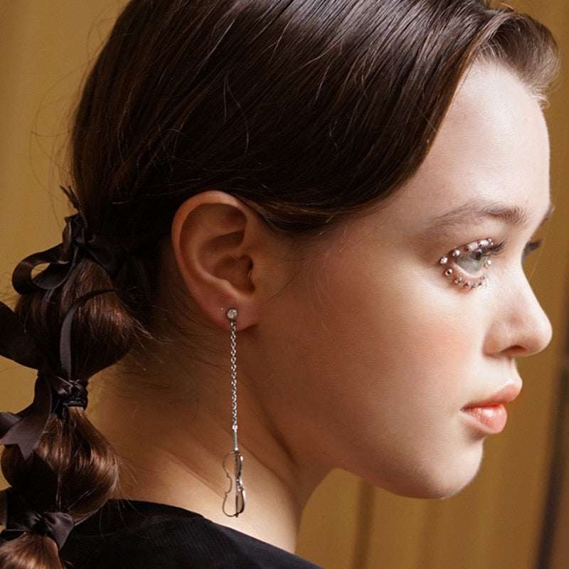 Asymmetric Cello Hollow Dangle Earrings