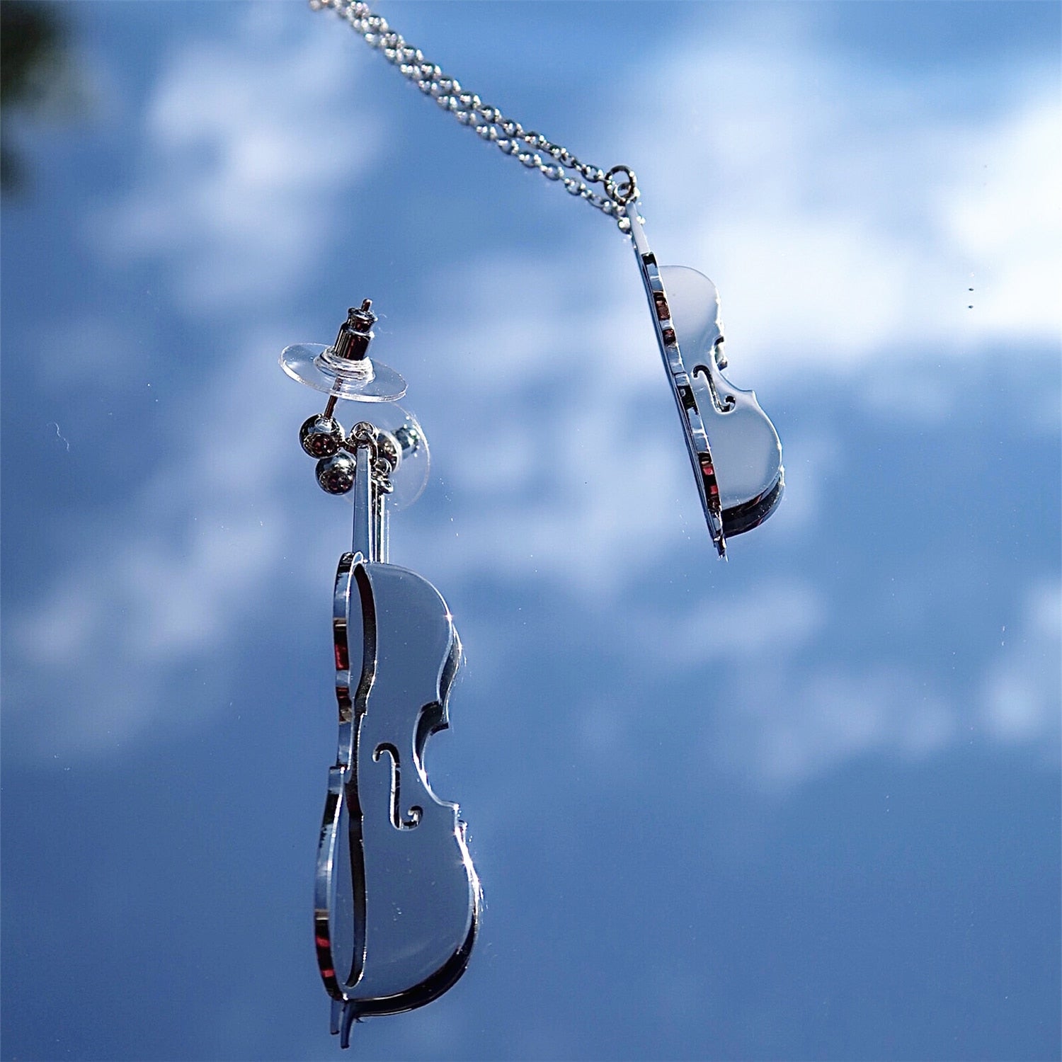 Asymmetric Cello Hollow Dangle Earrings