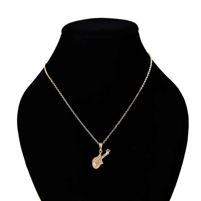 Enchanted Gold Guitar Necklace