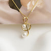 Pearl Music Treble Clef Necklace