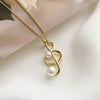 Pearl Music Treble Clef Necklace