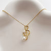 Pearl Music Treble Clef Necklace