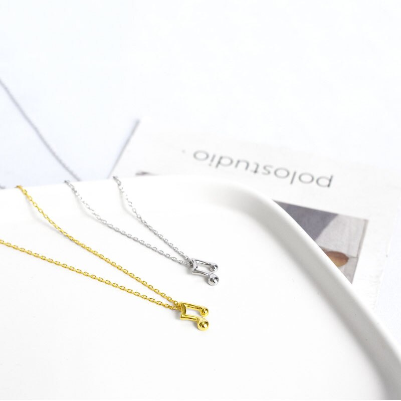 Tiny Eighth Note Necklace