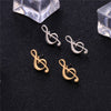 Free - Tiny Music Note Stud Earrings