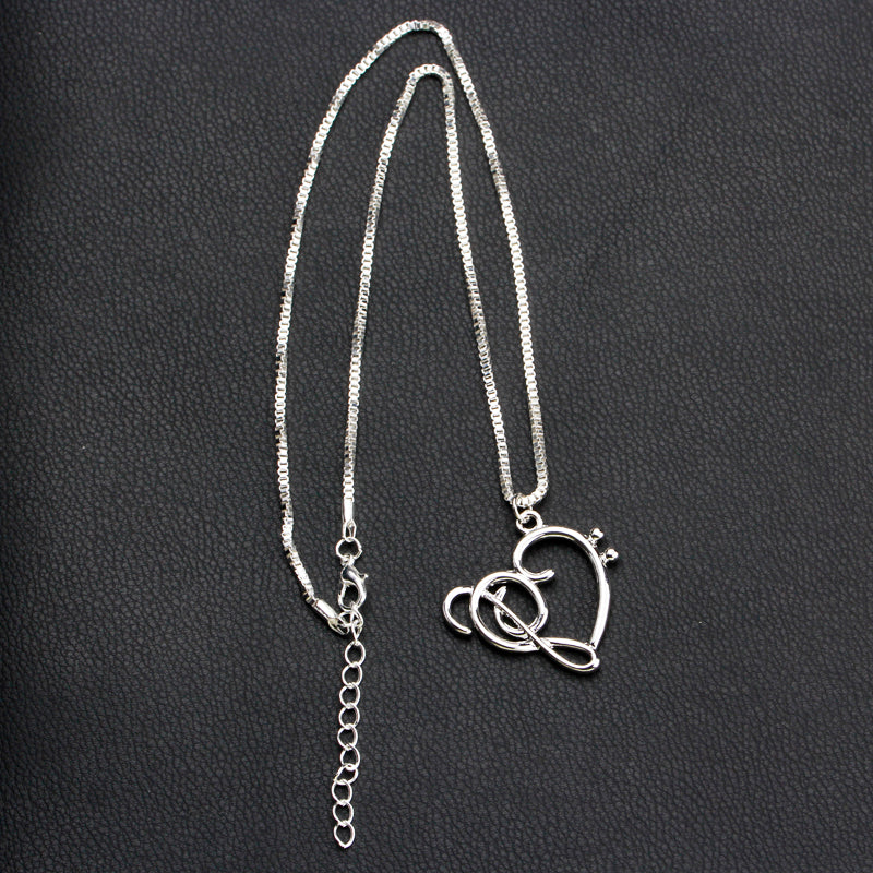 Free - Tiny Music Notes Heart Necklace