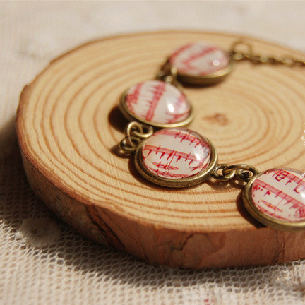Red Music Notes Bronze Bracelet