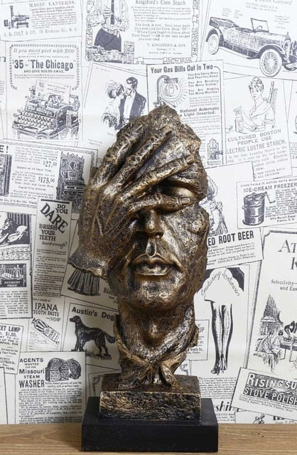 Do Not Listen and Watch Sculpture