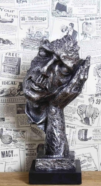 Do Not Listen and Watch Sculpture