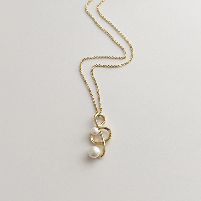 Pearl Music Treble Clef Necklace