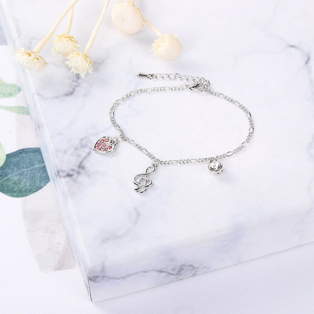 Rhinestone Heart Treble Clef Bracelet
