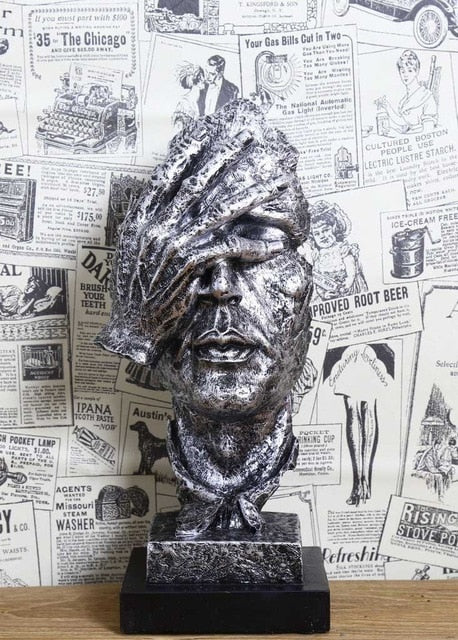 Do Not Listen and Watch Sculpture