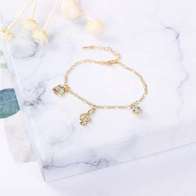 Rhinestone Heart Treble Clef Bracelet
