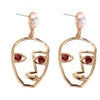 Abstract Face Art Earrings - EA721 Brown - { shop_name }} - Review