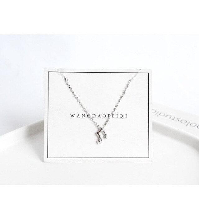 Tiny Eighth Note Necklace